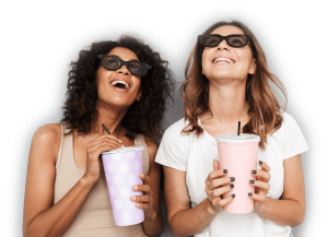 portrait-of-two-smiling-young-women-in-3d-glasses-4L9GB6W